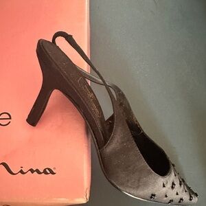 Sling back black satin heels, with sparkling accents